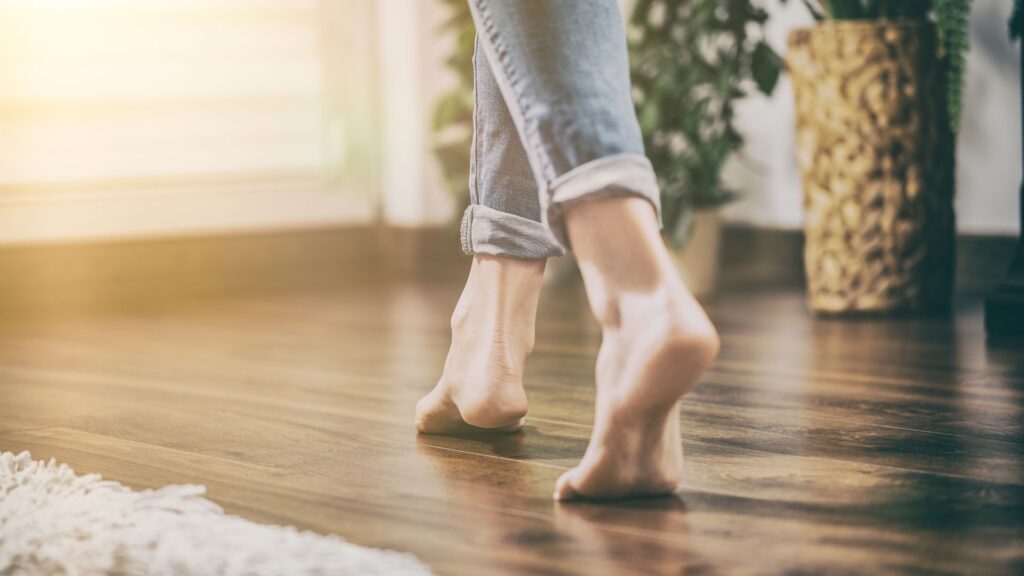 Woman walking confortably on heated flooring