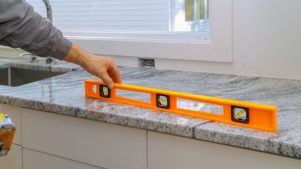 Measuring kitchen counter with a level